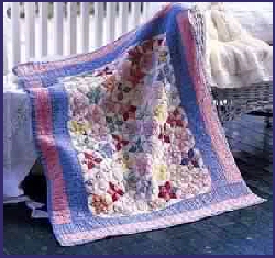  Comfy Country Creations has 
							a large selection of hand crafted quilts.