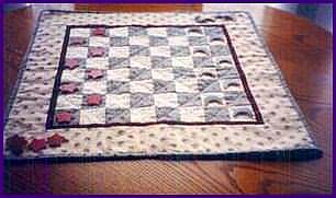 Quilted gameboards can be used as decorative coffee table centerpieces.