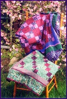 Lap Quilts can be used as wallhangings as well.